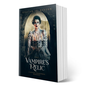 The Vampire's Relic cover: a lesbian gothic romance. A pale woman with haunted eyes looks directly at the viewer. She is wearing an elaborate Victorian dress tightly buttoned up to conceal her neck. Her dark hair is elaborately curled and drawn back. She holds a lit candelabra before her. Behind her the full moon shines through the ruins of a castle. 