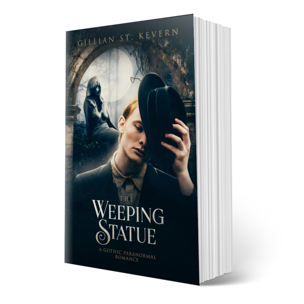 The Weeping Statue cover: A pale young man with red hair wearing a somber suit is in the act of removing his hat. His expression is mournful. Behind him, the stone statue of a woman is illuminated by the full moon, bathing the forest in an eerie glow.